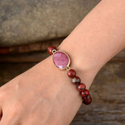 Rhodonit- und Red Jasper -Armband
